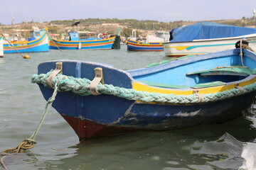 Fototapeta na wymiar traditional colored fisherman's boat in Malta