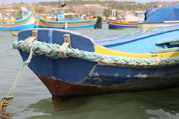Fototapeta na wymiar traditional colored fisherman's boat in Malta