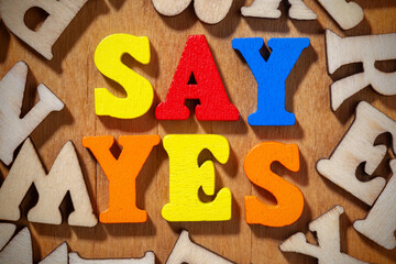Say Yes - Text by color letters