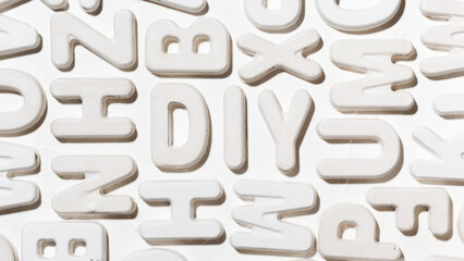 DIY abbreviation by white moulded letters