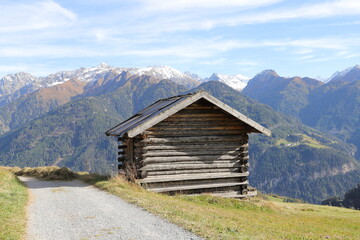 an old little crooked hut in the alps