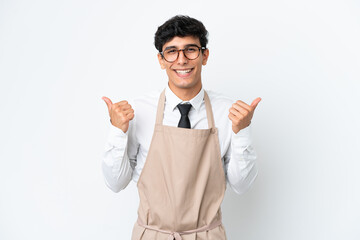 Restaurant Argentinian waiter isolated on white background with thumbs up gesture and smiling