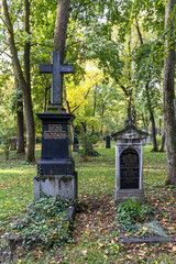 View of famous Old North Cemetery of Munich, Germany with historic gravestones.