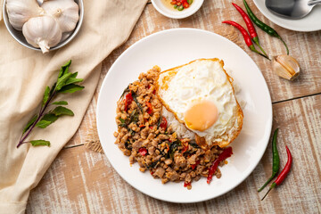 Rice with stir fried Minced Pork and basil with topped fried egg,Thai food.Top view