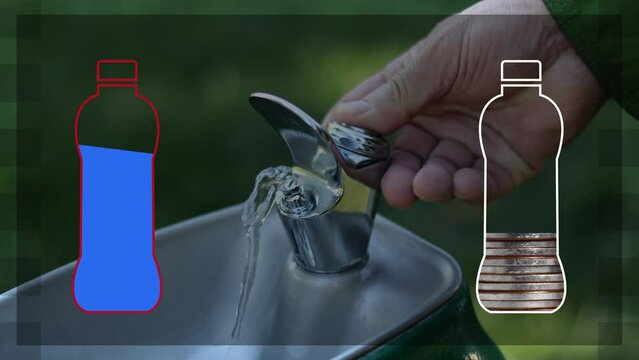 A man's hand using water. The concept of water shortages coming up in the future.
