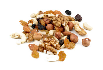 a mix of different varieties of nuts and dried fruits on a white background