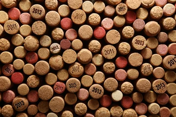 Küchenrückwand glas motiv Many wine corks with different dates as background, top view © New Africa