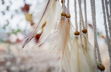 Dreamcatcher with feathers threads and beads rope hanging