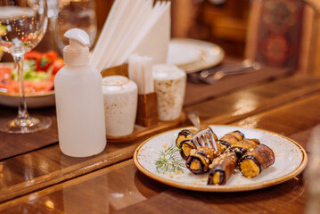 Laid table in the restaurant. Beautiful serving. Reserved table in the restaurant.
