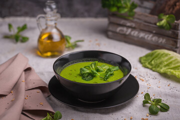 Vegetarian healthy soup. Green pea cream soup 
