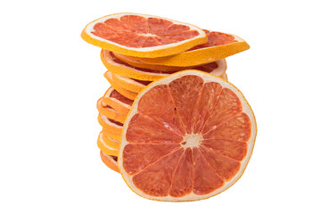 Fototapeta na wymiar sliced pieces of dried grapefruit, on a white background, close-up