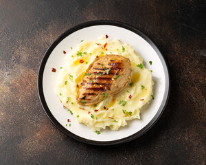 Vegan vegetarian Plant based chicken breast served with mashed potato