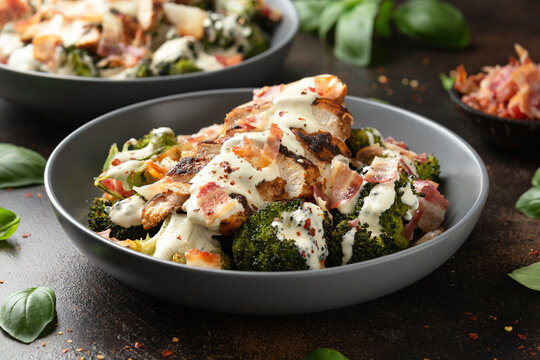 Baked chicken, broccoli with creamy cheese sauce and bacon