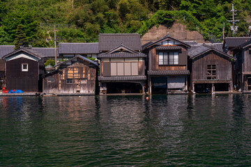 Fototapeta premium Lined up boathouses at Ine Town in Kyoto, Japan.