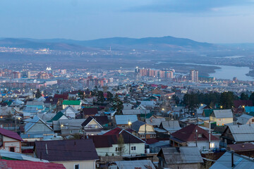 View of the evening city of Ulan-Ude and the Selenga River from the mountain