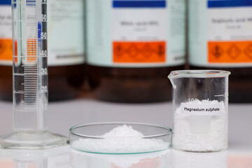 Magnesium sulphate in glass, chemical in the laboratory and industry