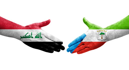 Handshake between Equatorial Guinea and Iraq flags painted on hands, isolated transparent image.