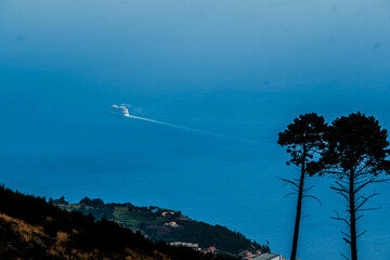 A large cruise ship leaves Madeira in search of its next destination