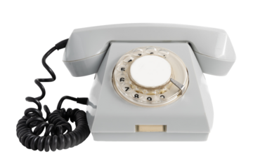 Old disused landline gray colored telephone close-up isolated on white transparent background without shadow