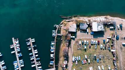The boat station is on top. A lot of motorboats on the water, taken from above