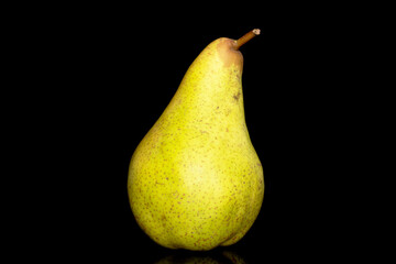 One juicy pear, macro, isolated on black background.