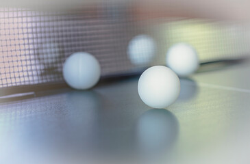 Tennis balls on a blurred background.