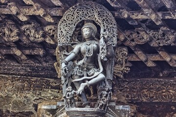 Dancing girl sculpture of Sri Chennakeshava Swamy Temple, Belur, Black soap stone, Karnataka, India