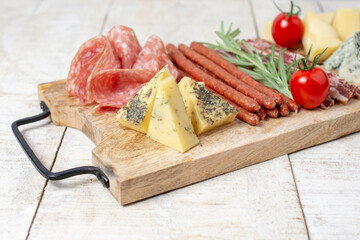 Italian appetizers table with different antipasti, charcuterie, snacks and cheese. Buffet party.