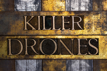 Killer Drones text on grunge textured copper and gold background