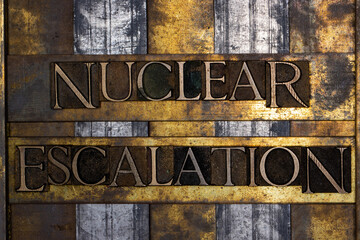 Nuclear Escalation text on grunge textured copper and gold background