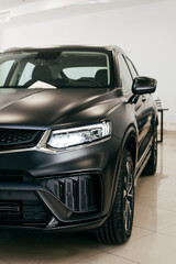 Black car headlight close up, beautiful car design