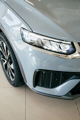 Grey car headlight close up, beautiful car design