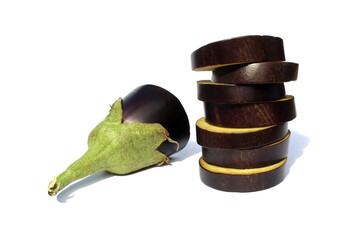 Sliced eggplant in circles lies on a white background.