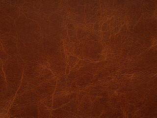 Dark orange, brown color leather skin texture, natural with design lines pattern or red abstract background. Can use as wallpaper or backdrop luxury event. Used for design clothes, handbags, belts.