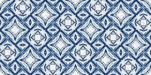 Indigo dye wash coastal damask seamless border pattern. Washed out geometric dip dyed blur effect edging. Nautical and marine ocean blue masculine endless tape background with linen texture trim.