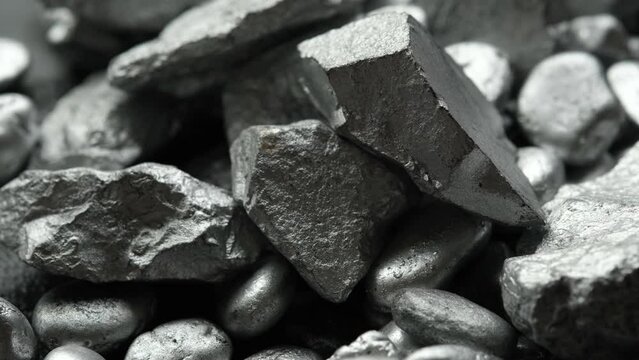 lump of silver or platinum or rare earth mineral on a floor	