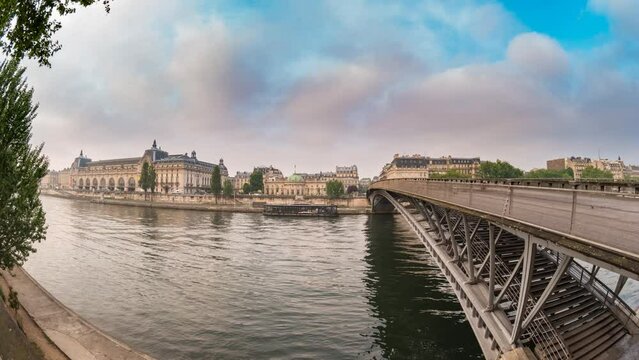 Paris France time lapse 4K, city skyline timelapse at Seine River and Passerelle Leopold Sedar Senghor Bridge