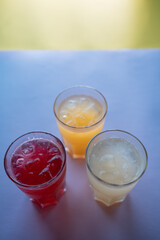 glasses set with fruit fresh colored juice of berry, lemon, ginger, strawberry