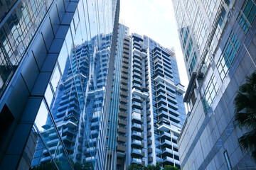 low angle view of singapore city buildings.