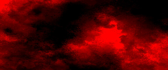 Red powder explosion on black background. Freeze motion of Red dust particles splash, grunge background texture for banner, backdrop.
