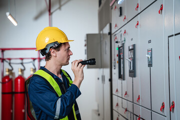 A team of experts checked at the electrical switchboard and check the integrity of the system in...