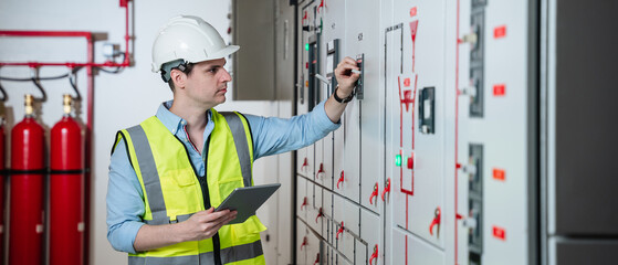 A team of experts checked at the electrical switchboard and check the integrity of the system in...