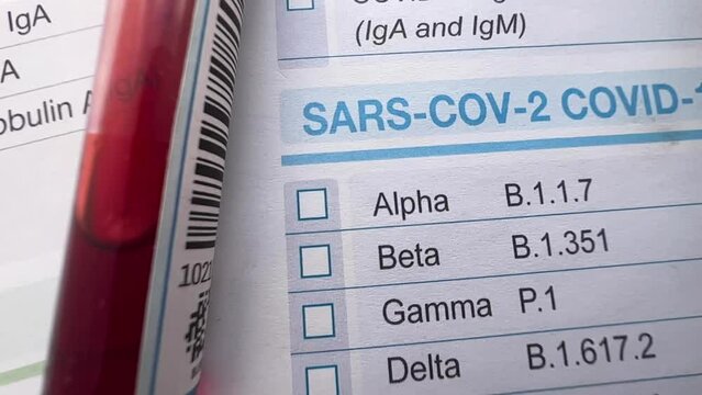 Request form for analysis of blood samples for coronavirus antibody test. Blood sample from a patient on medical request form for analysis of covid-19 test