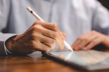 business communication technology concept, businessman person using digital pen to working on...
