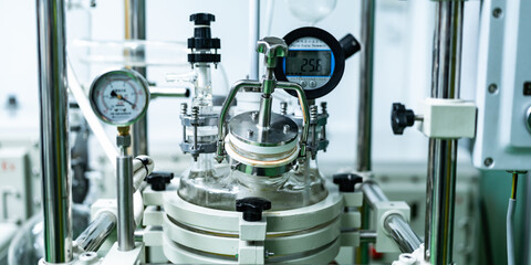 Cannabis ganja CBD oil scientific extraction machine, medicine factory technology for scientist worker in work of hemp plants process laboratory. chemical production equipment concept