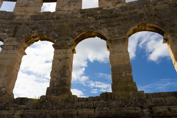 Fototapeta na wymiar Arches of the Pula Arena (Istria, Croatia) that was build by the Romans in the first century.