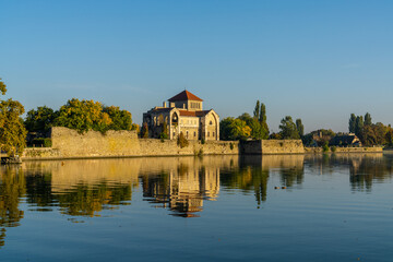 landscape view of Lake Oreg and the medieval Tata Castle in Hungary