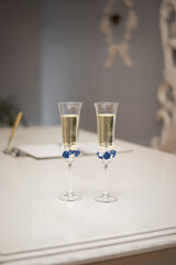 wedding glasses in the registry office on the table with champagne
