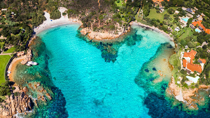 Italy summer holidyas . Sardegna island - stunning Emerald coast (Costa Smeralda) with  beautiful beaches. aerial view of small Romazzino beach