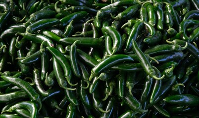 Green hot pepper. Neighborhood market stall.